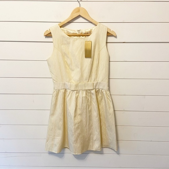 NWTs Francesca’s | Ivory/Gold Sparkle Fit and Flare Mini Dress with bow Medium - Picture 1 of 10